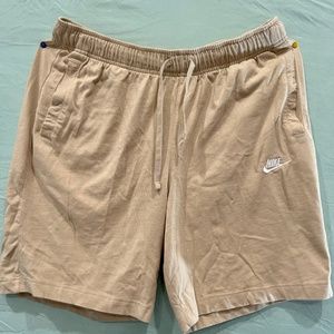 Never worn tan nike shorts